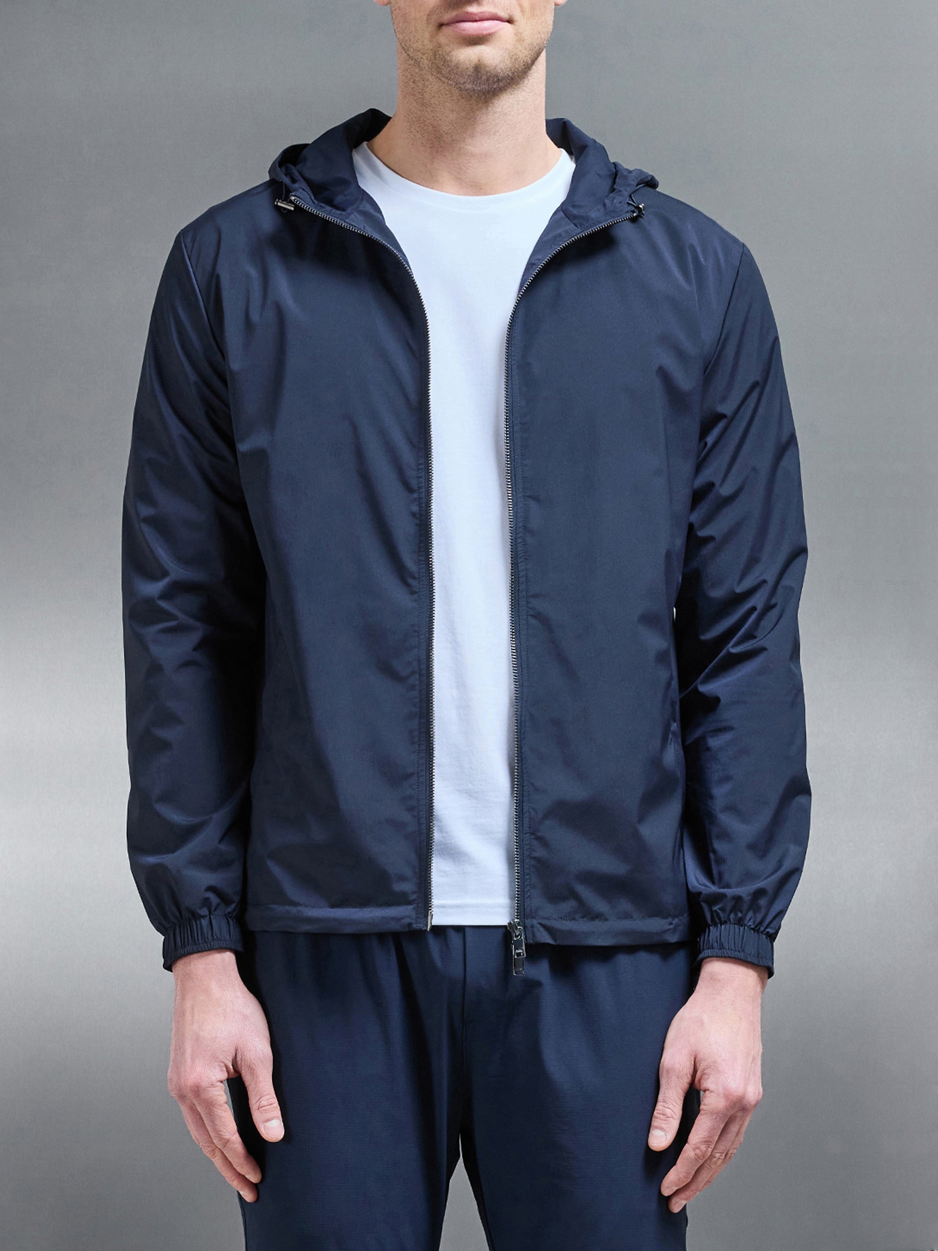 Utility Shell Windbreaker i Navy